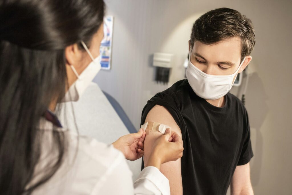 Healthcare professional providing a vaccination