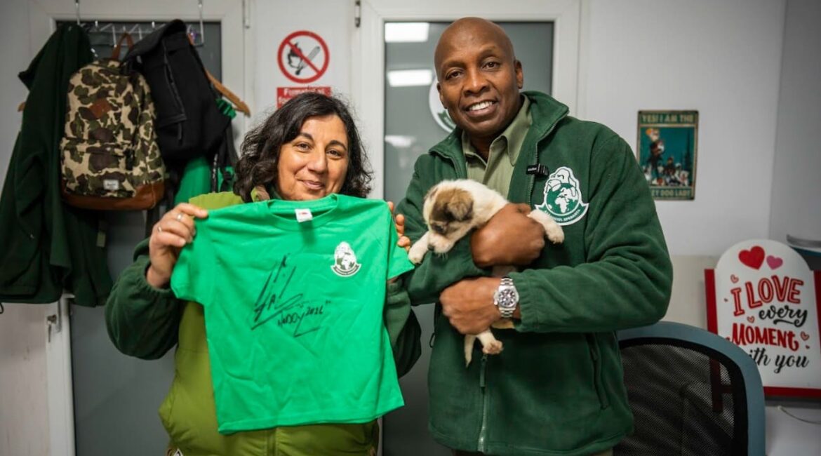 Speranta Shelter manager Anca Tomescu with Haddaway pictured holding a puppy