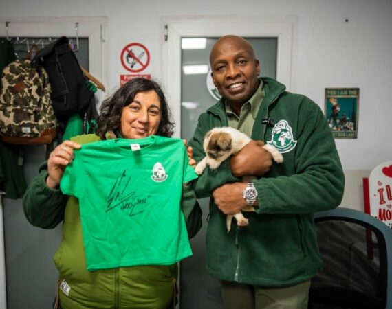 Speranta Shelter manager Anca Tomescu with Haddaway pictured holding a puppy