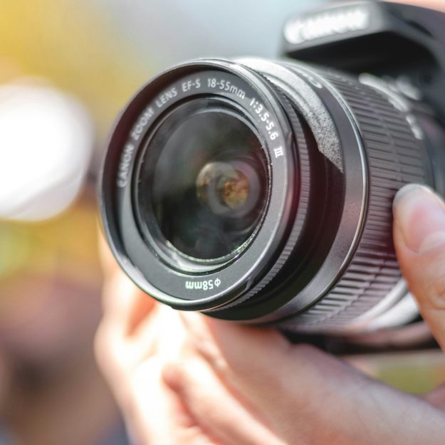 Someone taking a photo with a camera