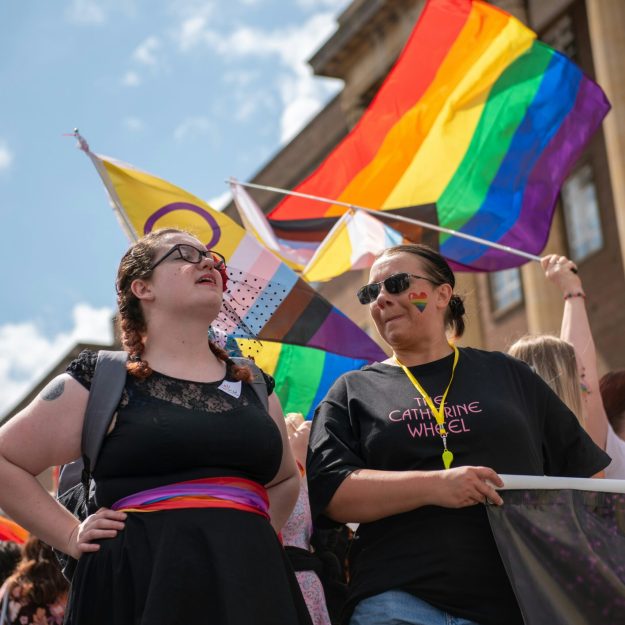 Two people at a Pride march