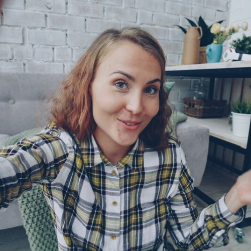 Woman taking a selfie video on mobile phone